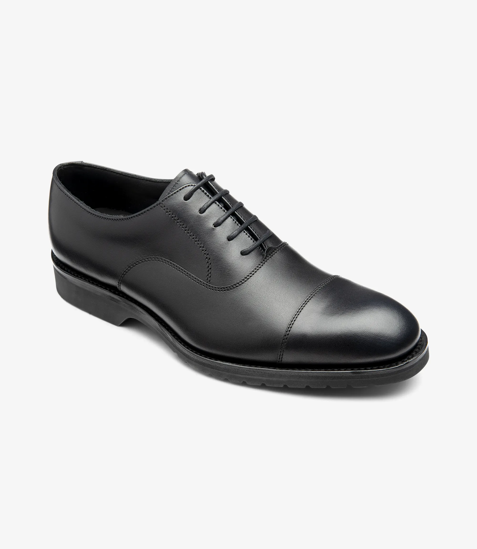 Men's Hitchcock Black toe-cap shoes featuring rubber soles | Angle View