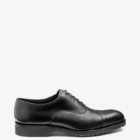 Men's Hitchcock Black toe-cap shoes featuring rubber soles | Side View