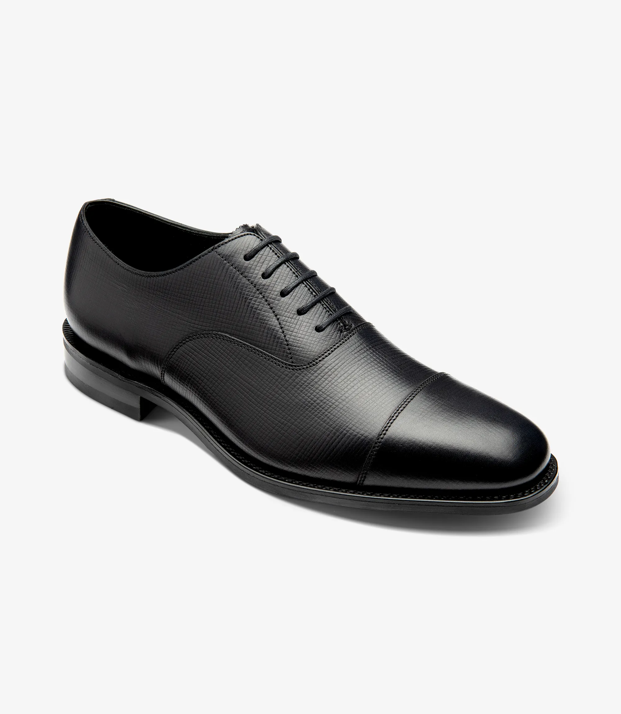 Men's Aldwych Black Grain toe-cap shoes featuring rubber soles | Angle View